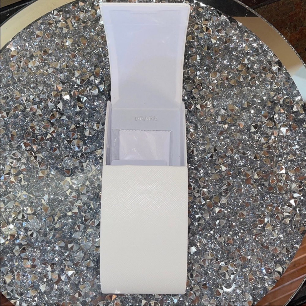 White Leather Sunglasses Case W/ New In Plastic Wipey + Card
Prada
$85 - Picture 4 of 6